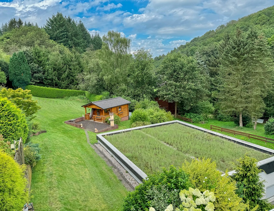 Einfamilienhaus mit Einliegerwohnung kaufen 1,5 Km Straßenhaus ISN-247 Garten